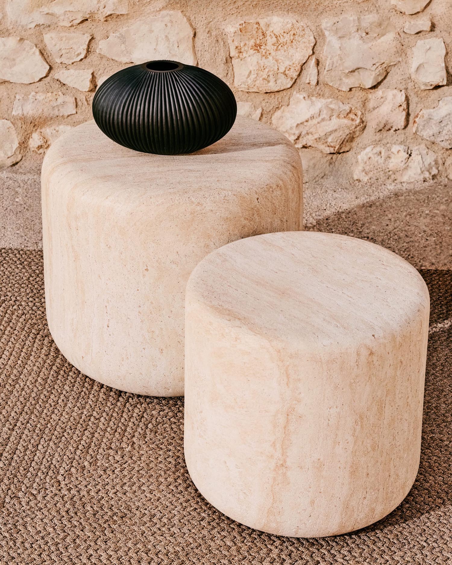 Side table Drasi made of cement with a travertine-look finish Ø 46 cm