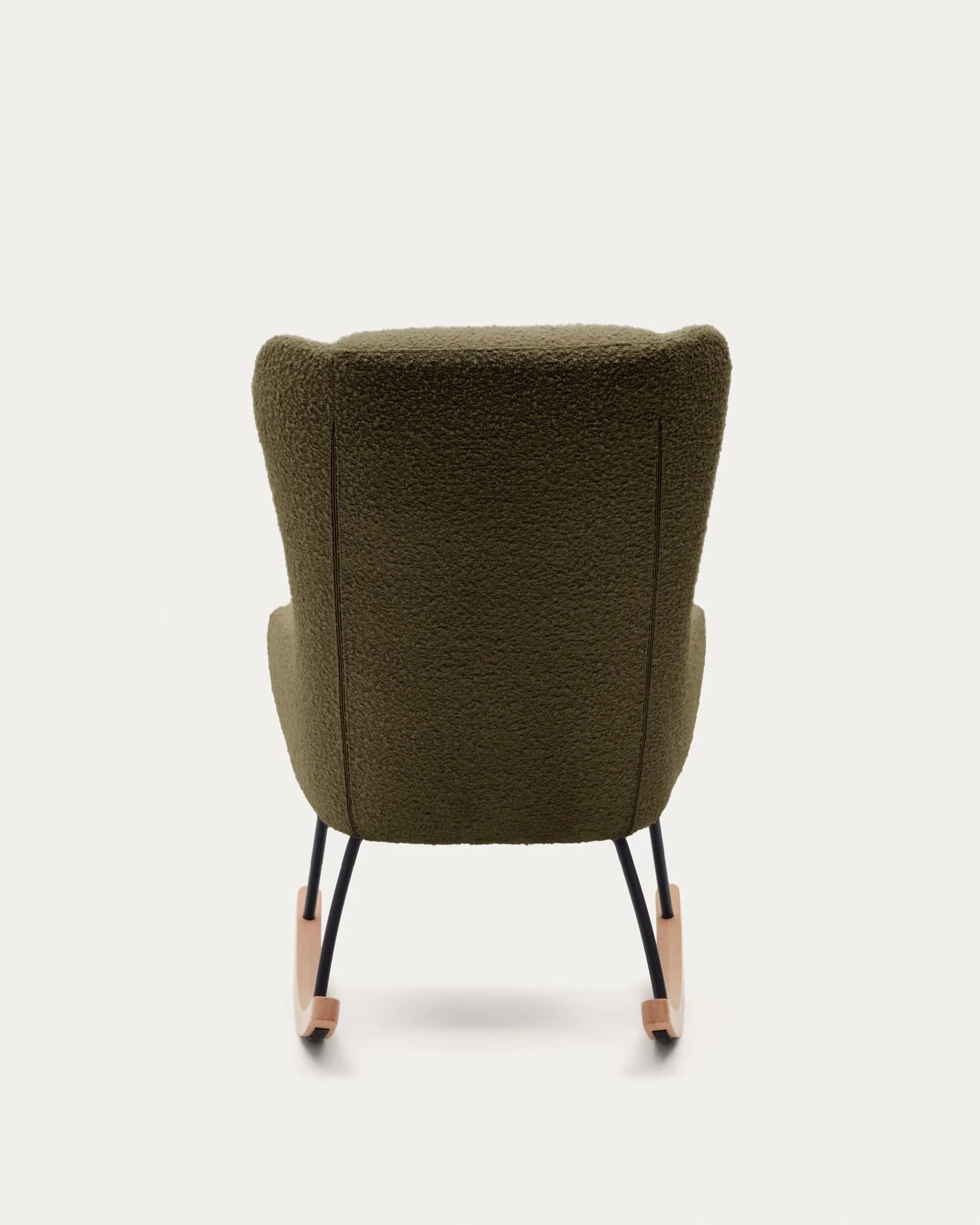 Eleganter Schaukelstuhl mit dunkelgrünem Bouclé, Stahl- und Buchenholzgestell, ideal für stilvolle Entspannung.