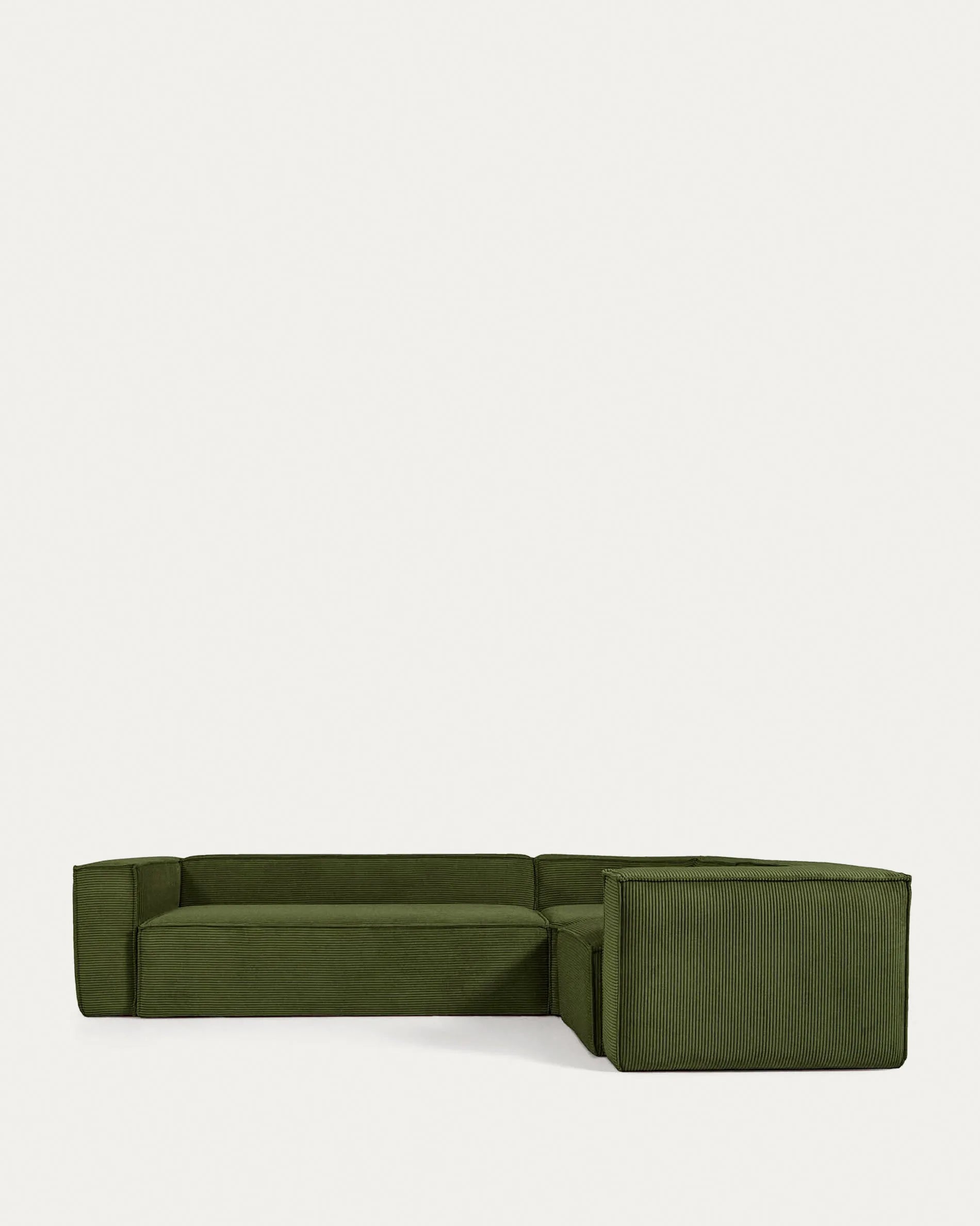 Elegantes Ecksofa in grünem Cord, 320x230 cm, bietet Komfort und Stil für Ihr Wohnzimmer. Modulares Design für flexible Anpassung.