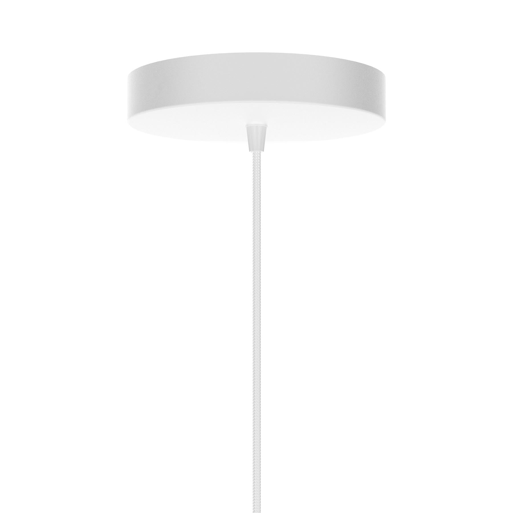 Schlichte, weiße Rosette von Umage, perfekt für Kabel- und Lampenfassungen, harmonisch integriert in ein modernes Interieur.