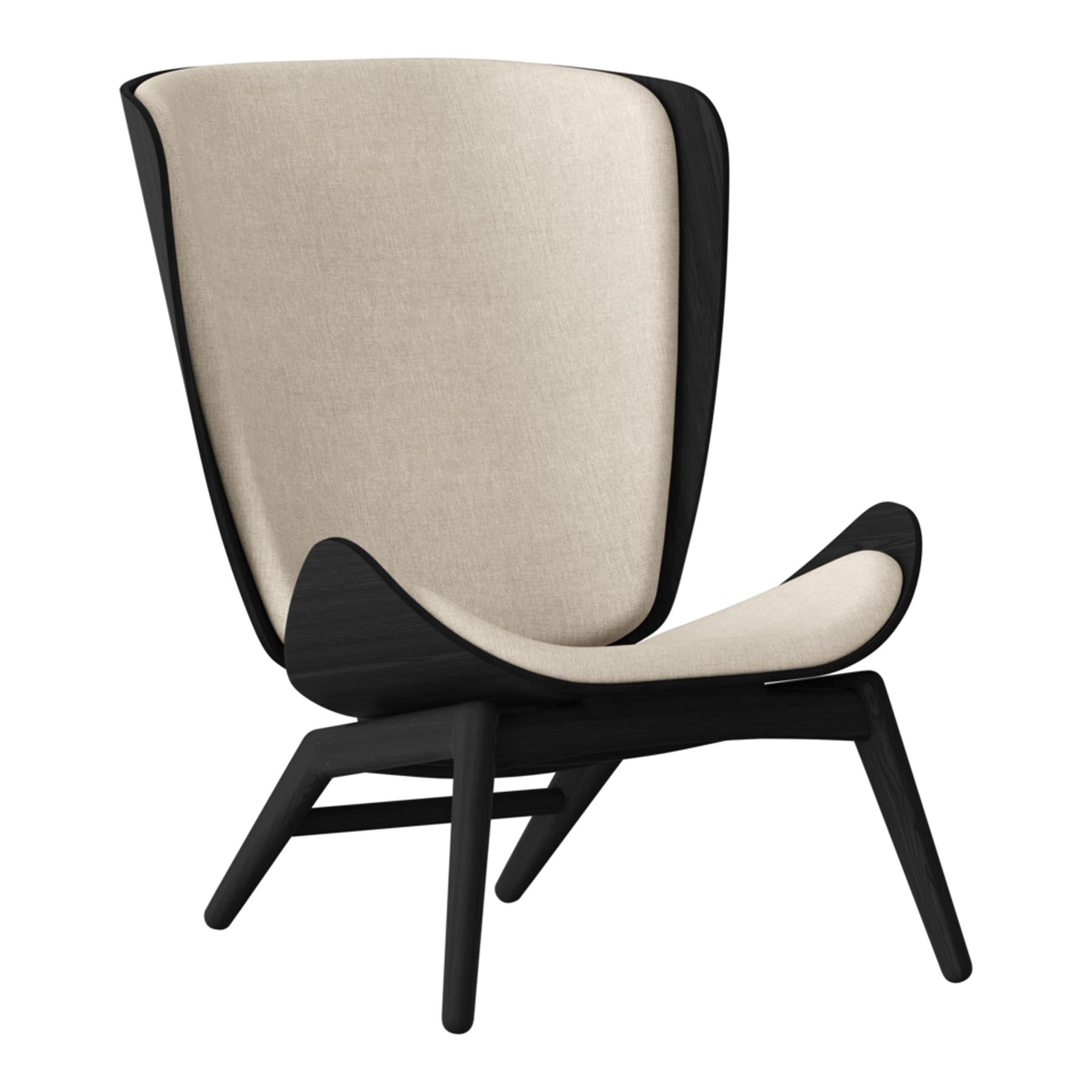 Eleganter Reader Sessel von Umage, der mit seinem stilvollen Design und komfortablen Sitzfläche ideal für gemütliche Leseecken ist.