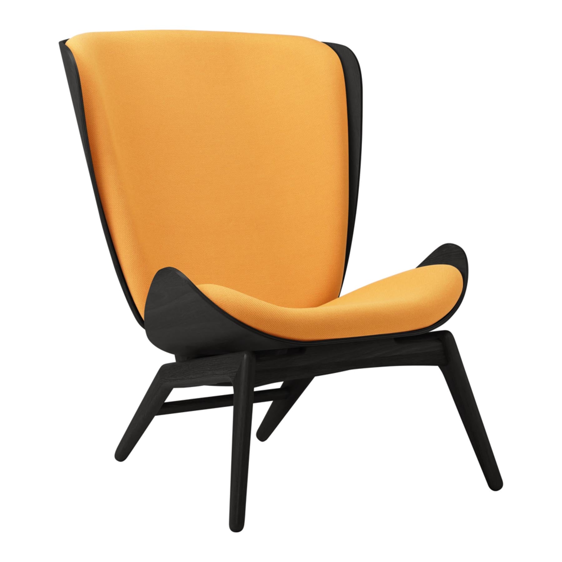 Moderner Reader Sessel von Umage, perfekt für entspannte Stunden. Sein stilvolles Design und die bequeme Polsterung machen ihn zum Blickfang.