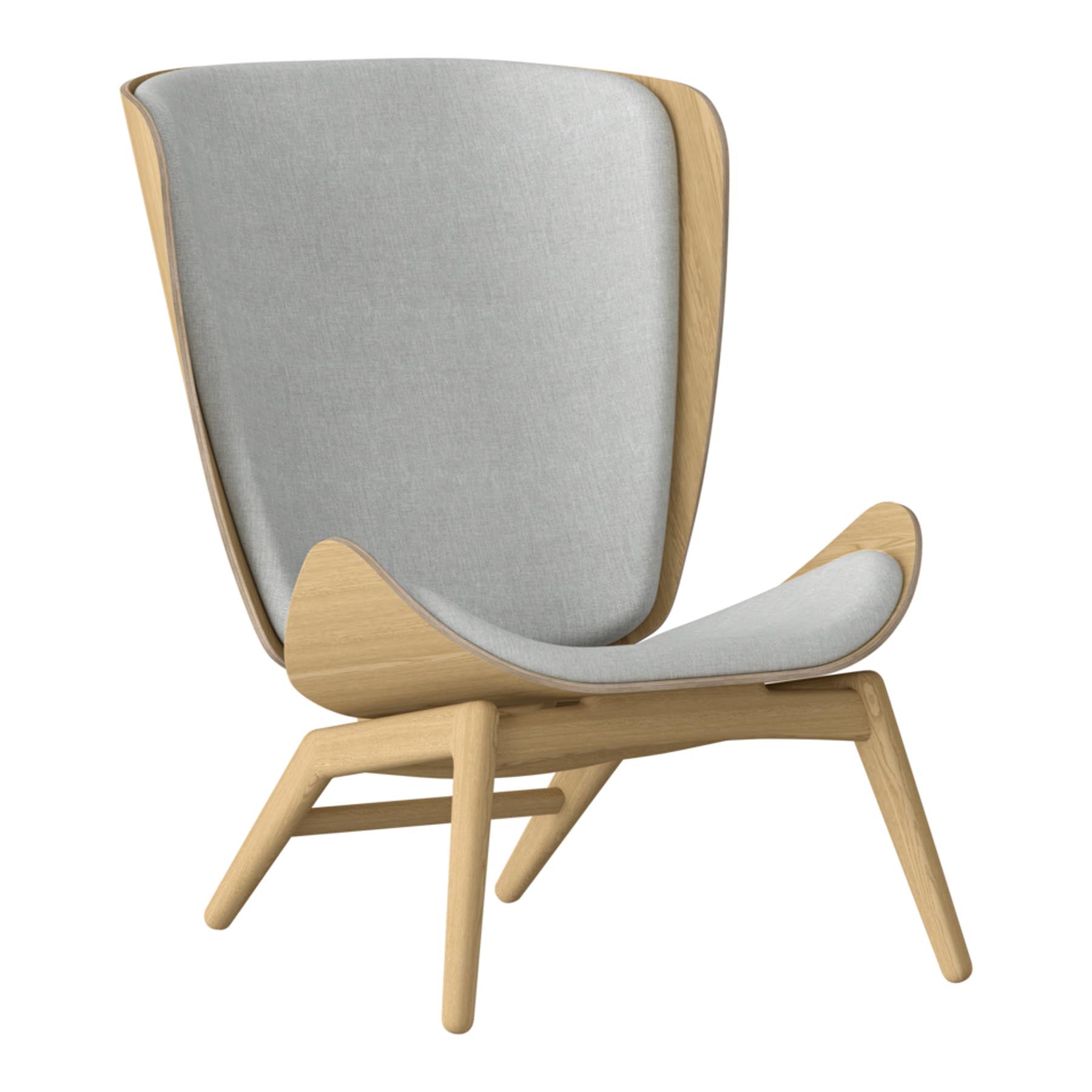 Eleganter Reader Sessel von Umage, der stilvolles Design und hohen Komfort vereint, ideal für gemütliche Leseecken.