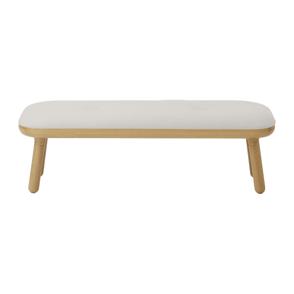 Stilvolle Paff low Bank von Umage in warmen Erdtönen, perfekt für entspannte Wohnräume. Kombination aus modernem Design und praktischer Nutzung.