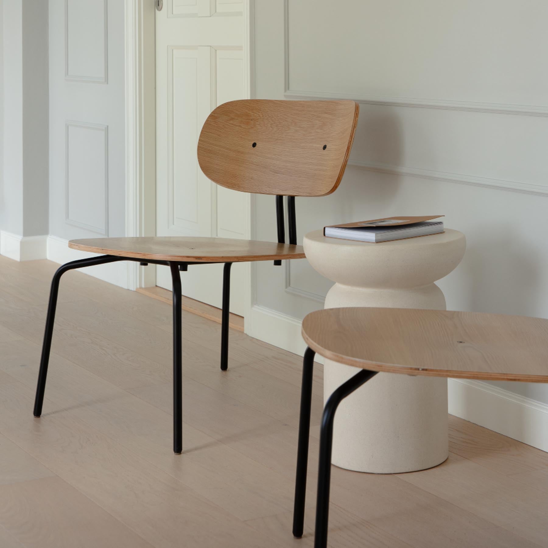 Eleganter Curious Sessel von Umage, stilvoll und modern, ideal für jedes Wohnambiente, ohne Polsterung für minimalistischen Look.