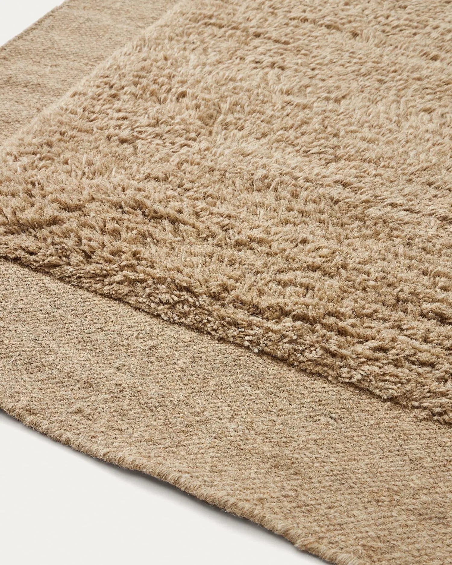 Der Marely Teppich aus 100% Wolle in Beige (160x230 cm) vereint Stil, Nachhaltigkeit und Komfort für Ihr Zuhause.