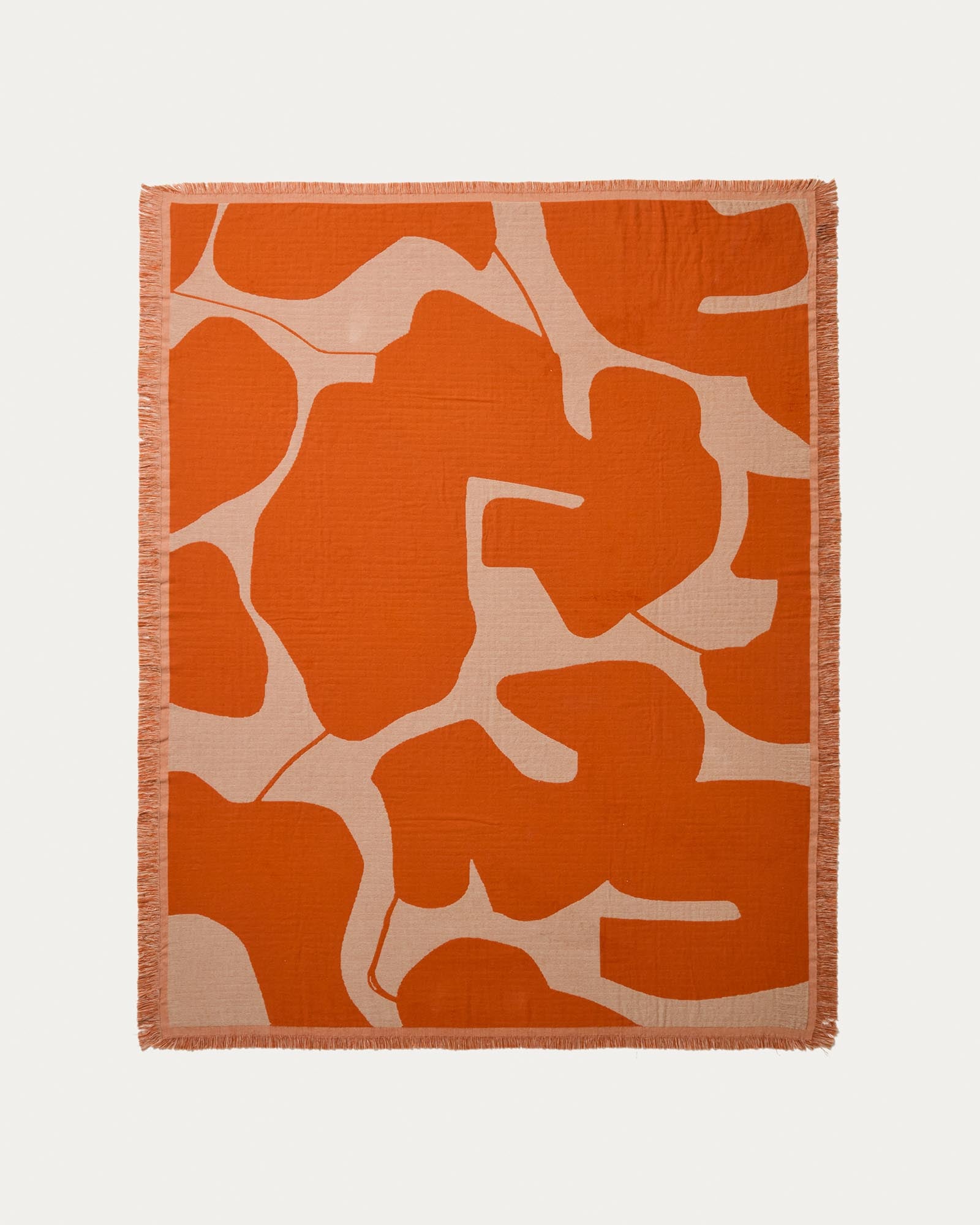 Wendedecke Niore aus 100 % Baumwolle in Orange und Beige 130 x 170 cm in Mehrfarbig präsentiert im Onlineshop von KAQTU Design AG. Wolldecke ist von Kave Home
