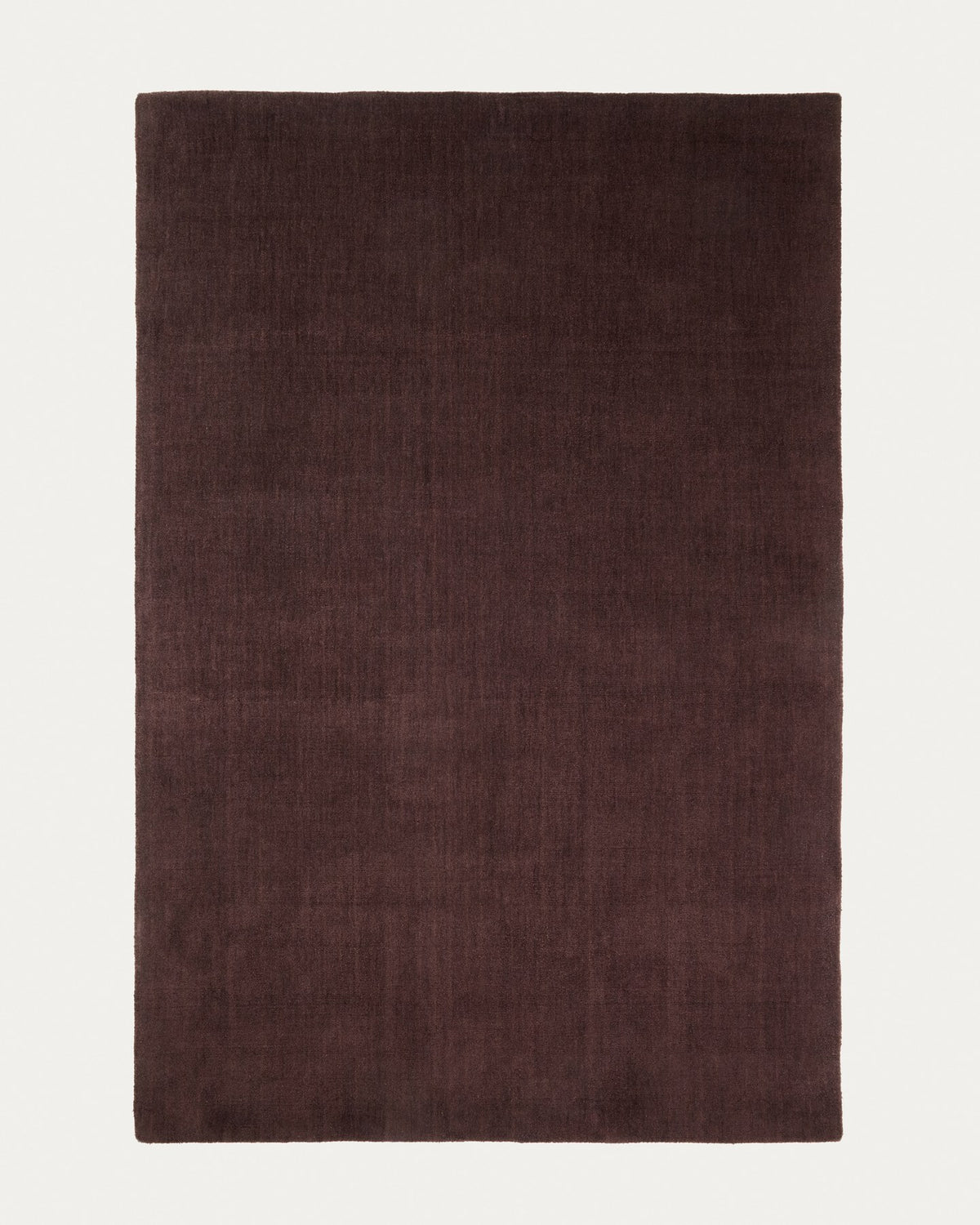 Brauner Empuries Teppich aus 100% Polyester in Wolloptik, handgefertigt, Format 200 x 300 cm, flauschige Oberfläche.