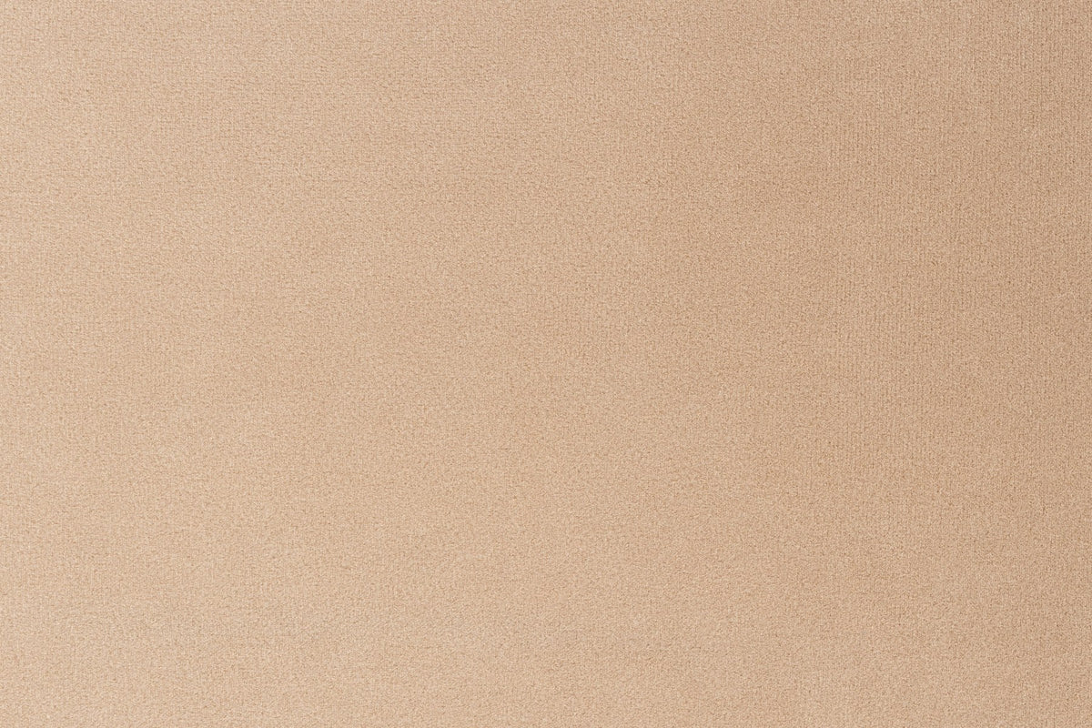 Beiger Hocker mit runden Formen, Polyesterbezug und Schaumstoffpolsterung, Modell Hazel von Zuiver, Masse 127x80x38 cm.