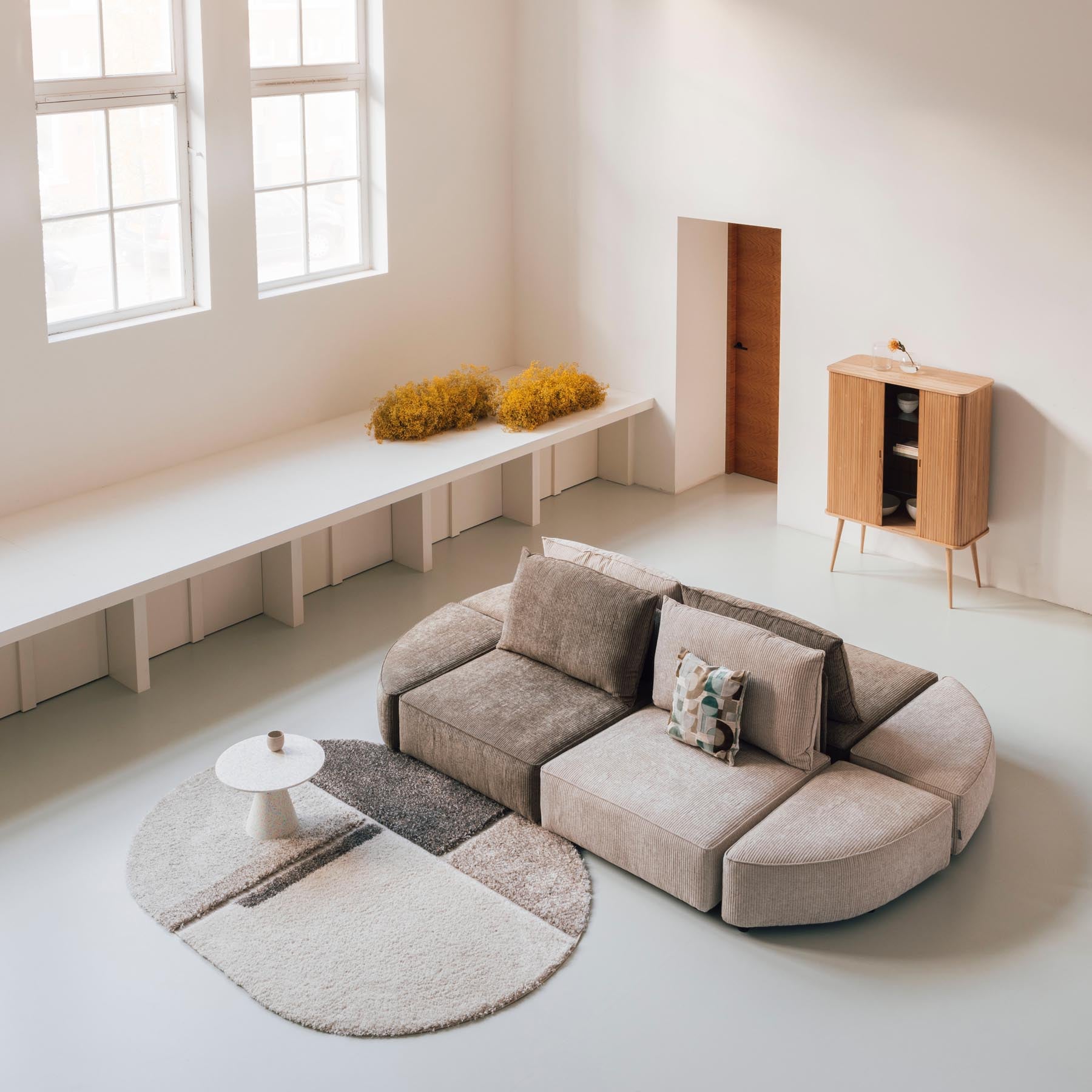 Sofa Element Hunter Pie Pouf links  in Sand präsentiert im Onlineshop von KAQTU Design AG. Modulares Sofa ist von Zuiver