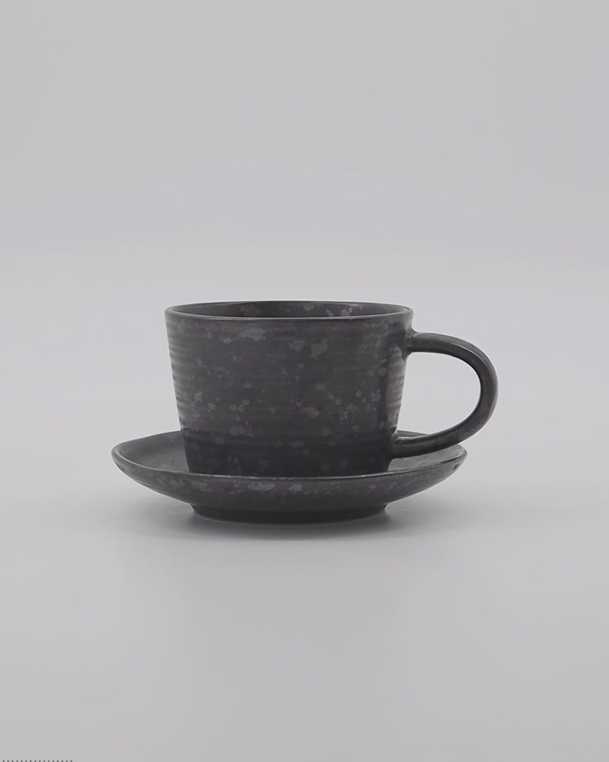 House Doctor Pion Tasse: Modernes Design in Schwarz/Braun.