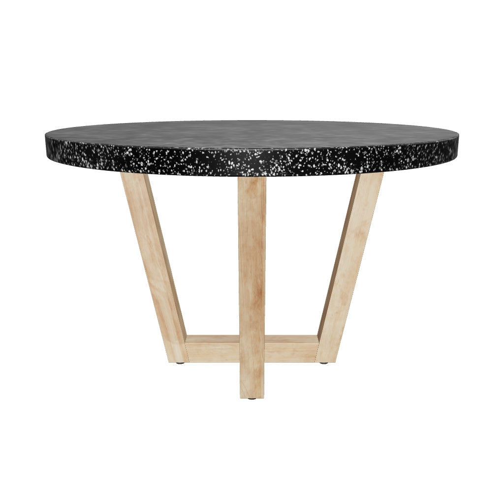 Runder Esstisch mit schwarzer Terrazzo-Tischplatte und stabilem Gestell aus massivem Akazienholz, perfekt für modernes Wohndesign.