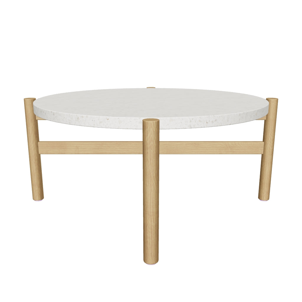 Moderner Couchtisch Pola mit runder Zementplatte und Beinen aus massivem Eukalyptusholz, Ø 84,4 cm, nachhaltig hergestellt aus FSC-zertifiziertem Holz.