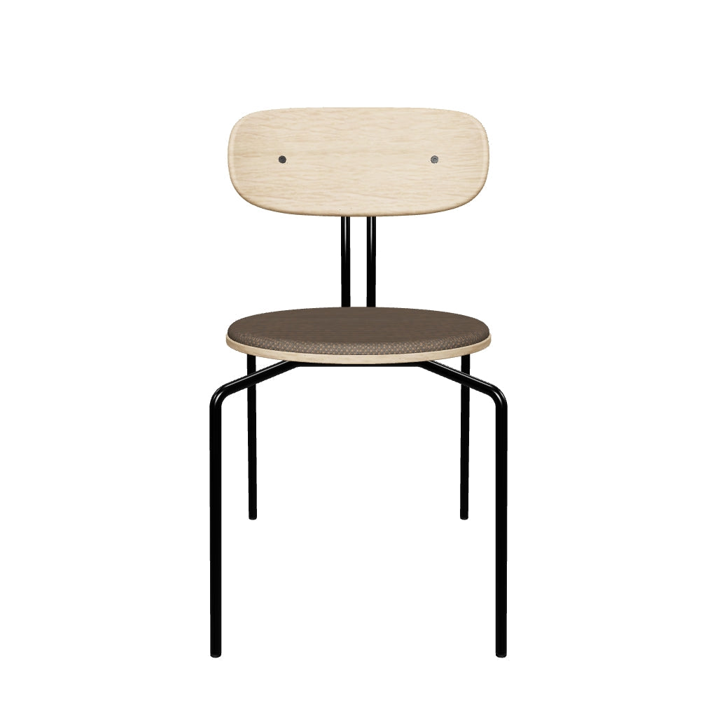 Curious Stuhl von Umage: Gepolsterter Komfort im modernen Design.